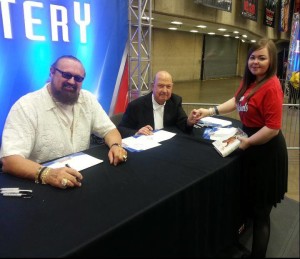 Gene Okerlund is holding my wife's hand.  I can live with that.